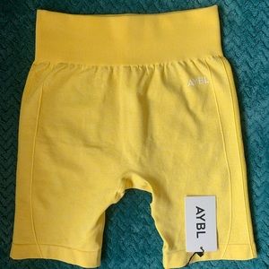AYBL bright yellow biker shorts